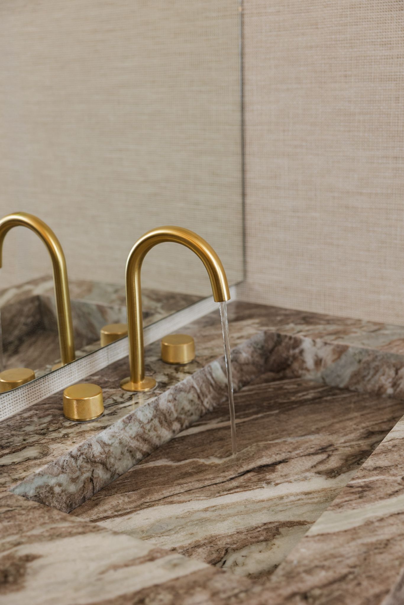 Walnut joinery with brass detail.